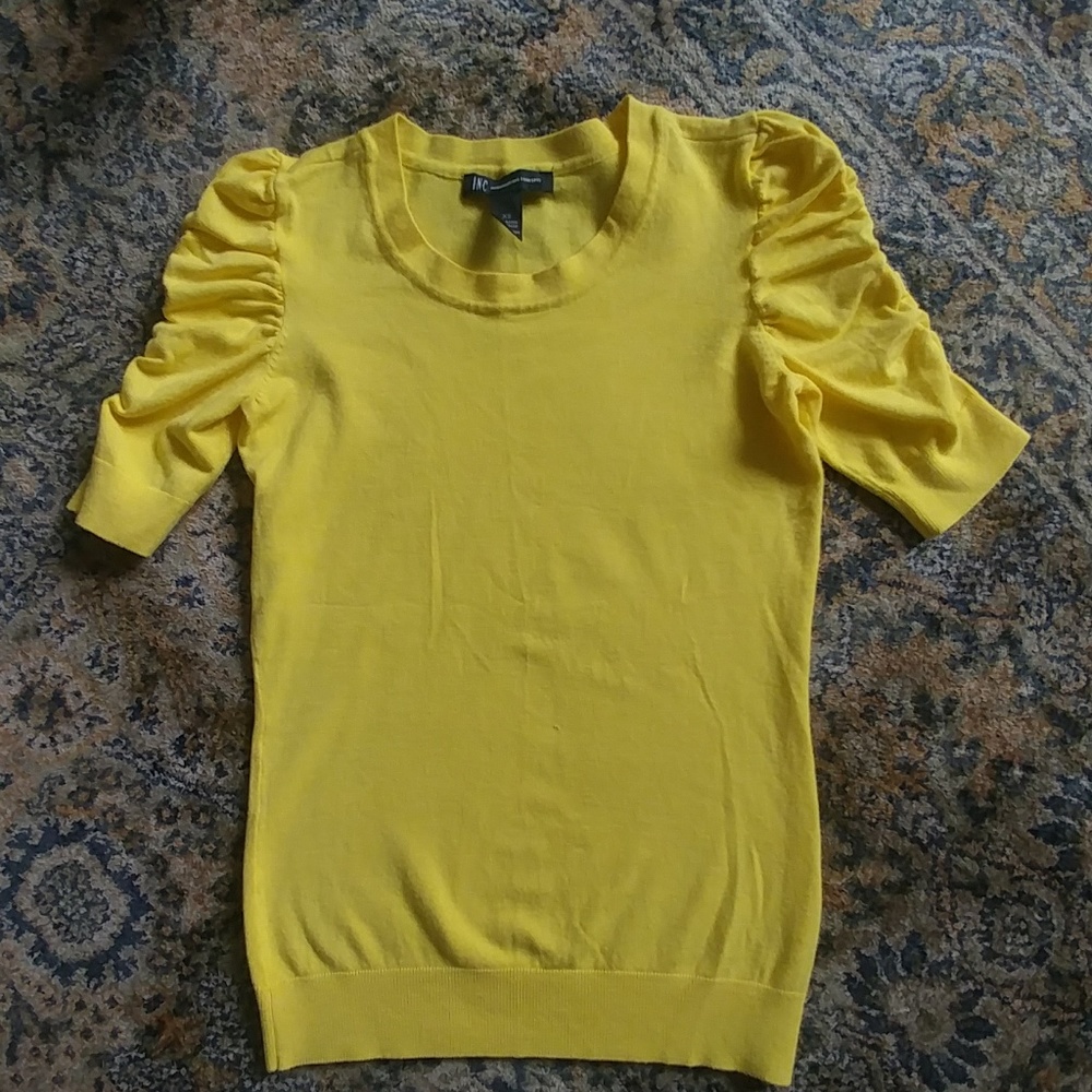 Bright yellow sweater